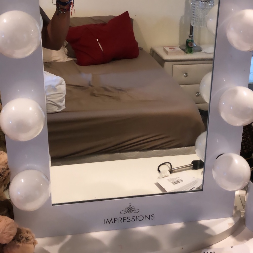 Impressions vanity mirror